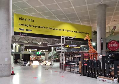 Idealista en el friso de llegadas del Aeropuerto de Málaga