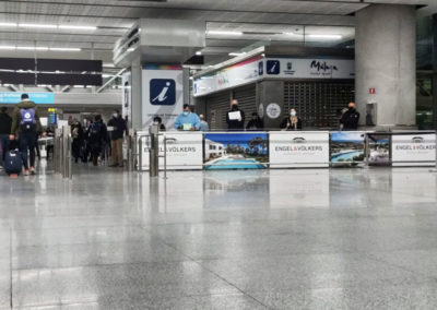 Salida de pasajeros del Aeropuerto de Málaga con gráficas de Engel & Volkers